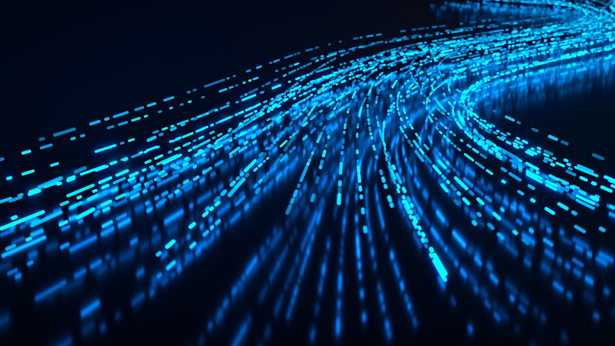 Bright blue light trails form flowing data streams across a dark background, suggesting high-speed data transfer and processing