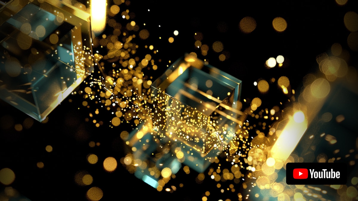 3D glass cubes surrounded by floating golden particles on a black background.