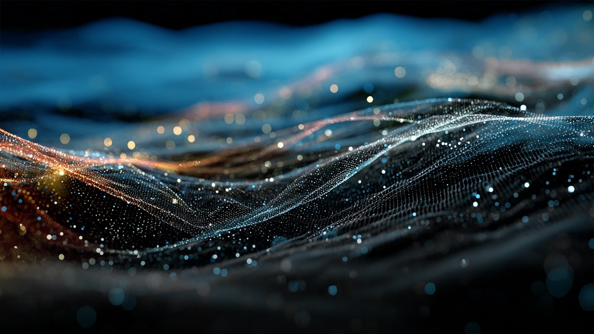Teal and orange particle wave forming a flowing mesh over a dark background with glowing points