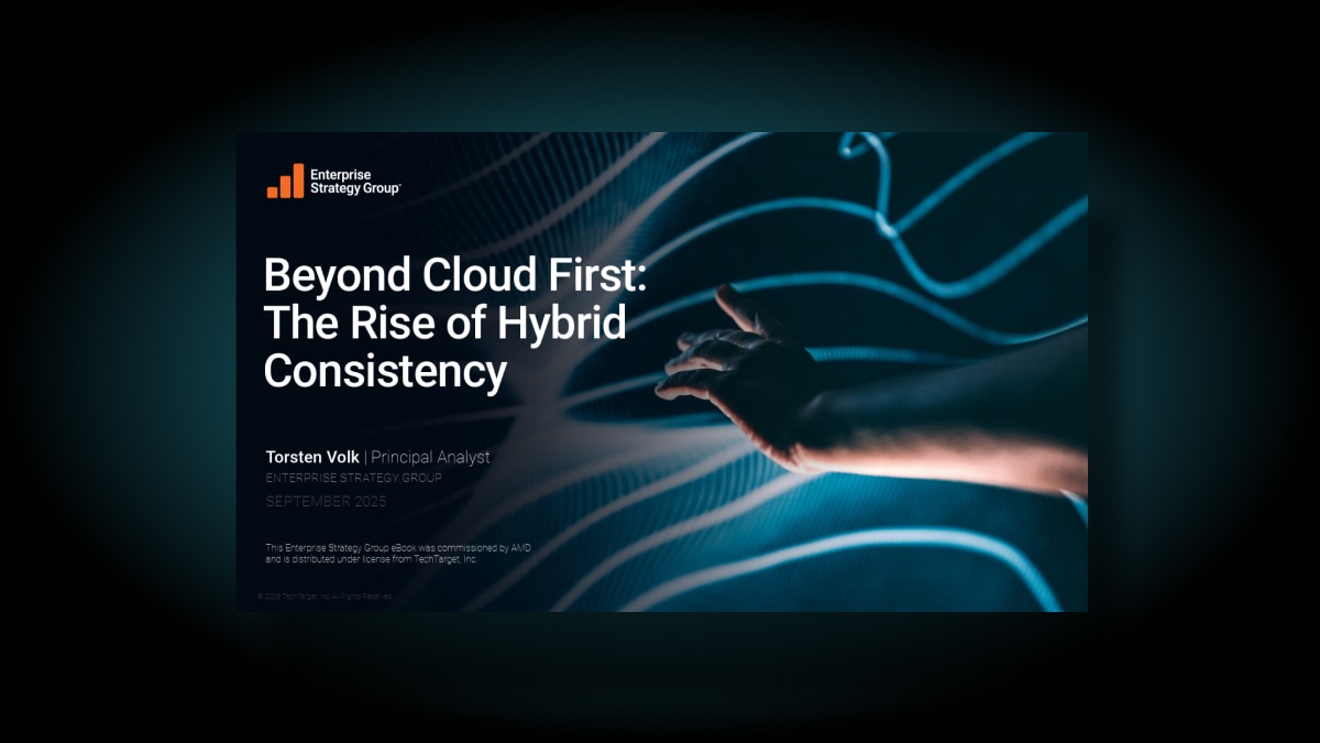 eBook cover titled “Beyond Cloud First: The Rise of Hybrid Consistency” by Enterprise Strategy Group, commissioned by AMD, featuring a hand interacting with abstract digital lines symbolizing hybrid cloud connectivity.