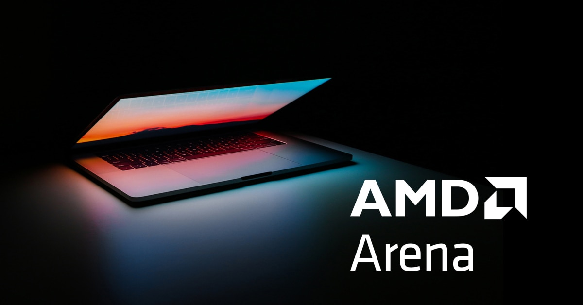 AMD Arena AMD Arena lockup in white color next to laptop