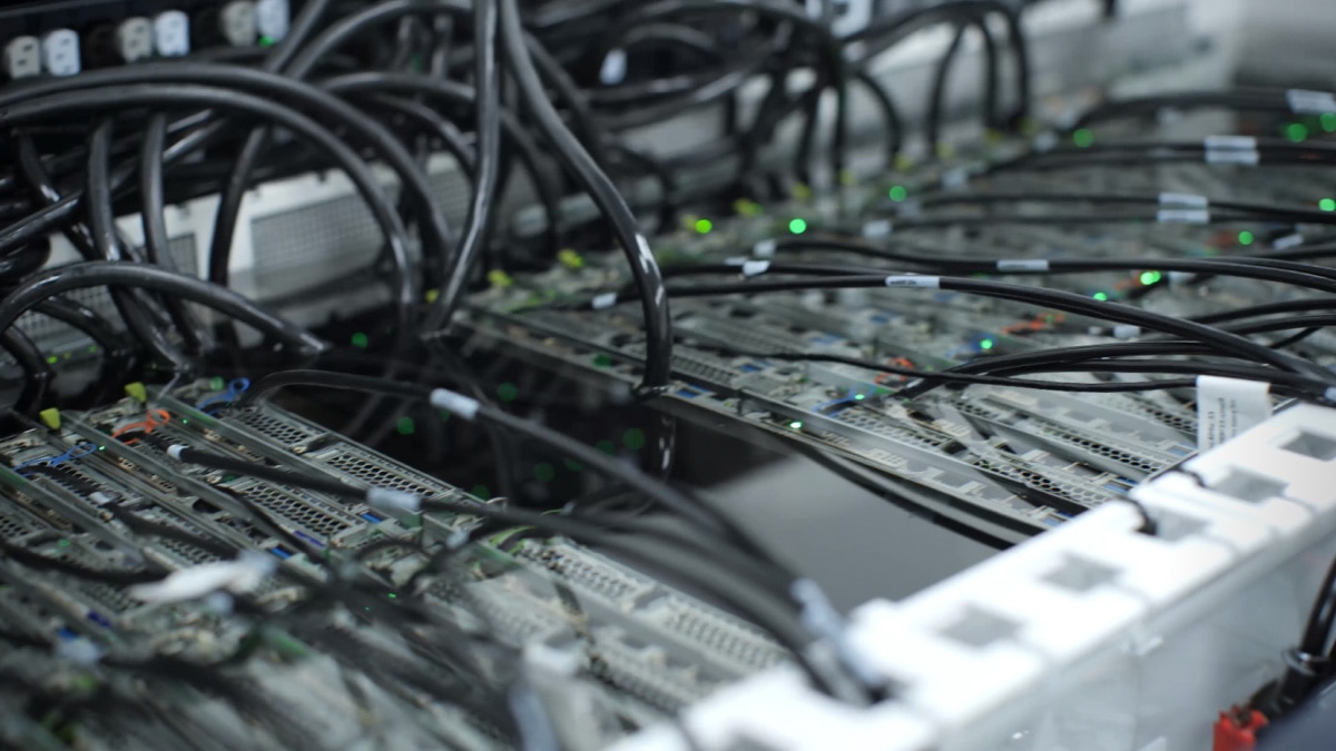 Servers are immersed in Shell's proprietary dielectric fluid, enabling faster conductivity of heat