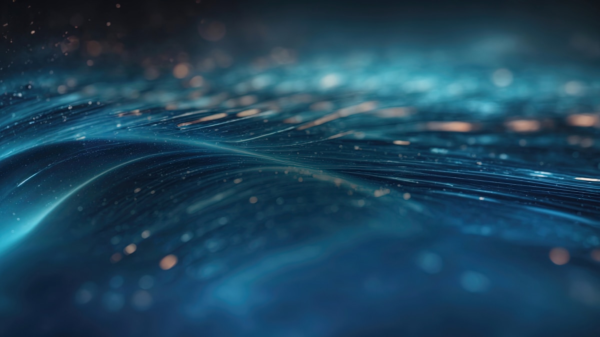 Abstract blue and teal wave texture with glowing light streaks and floating particles.