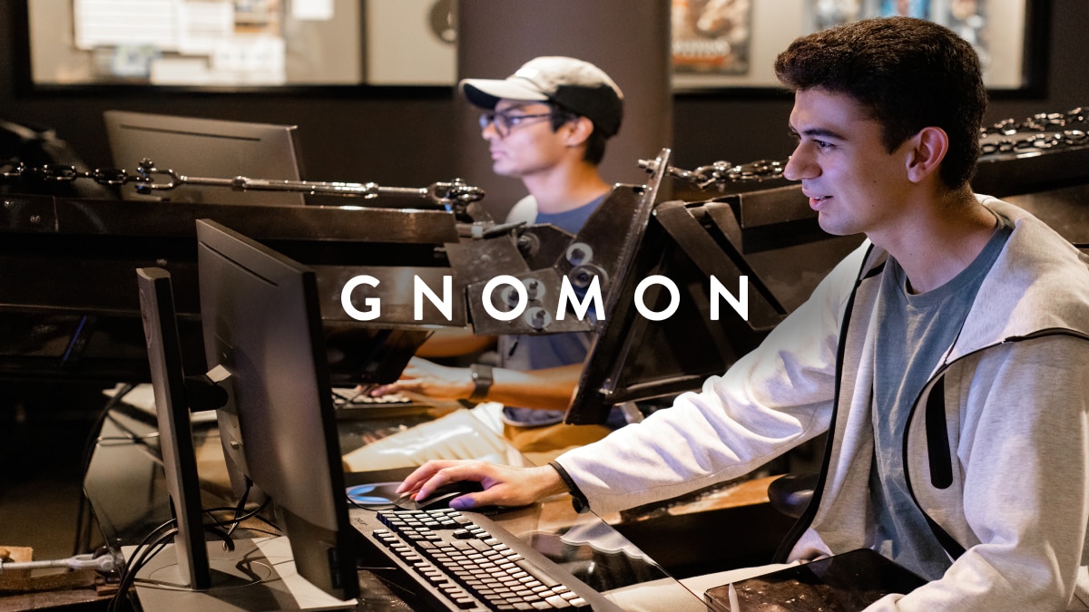 People working on computers with Gnomon logo overlay