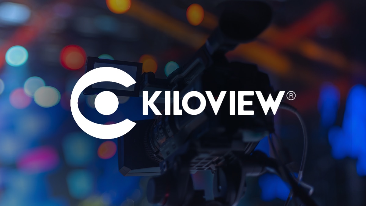 White KILOVIEW logo over a professional video camera with blurred blue, red, and orange studio lights.
