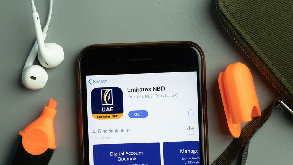 Mobile phone with Emirate NBD app on screen Mobile phone with Emirate NBD app on screen