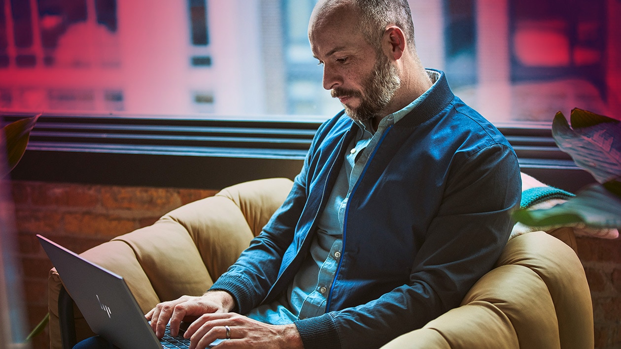 Man working on an AMD laptop