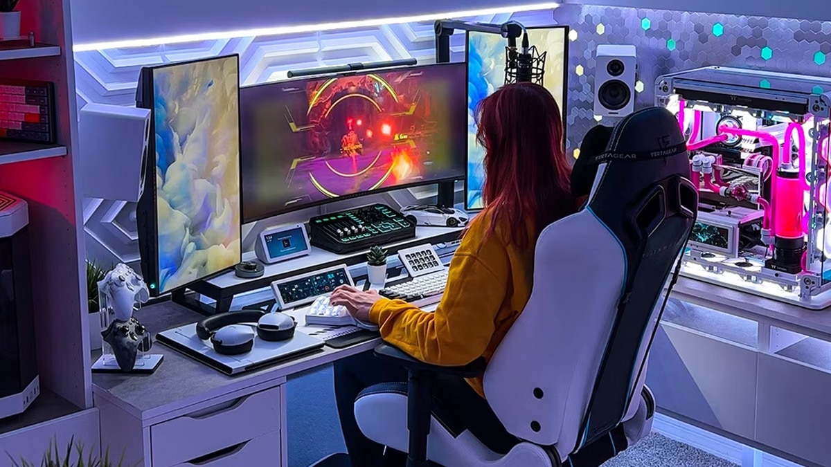 Woman playing video game on computer