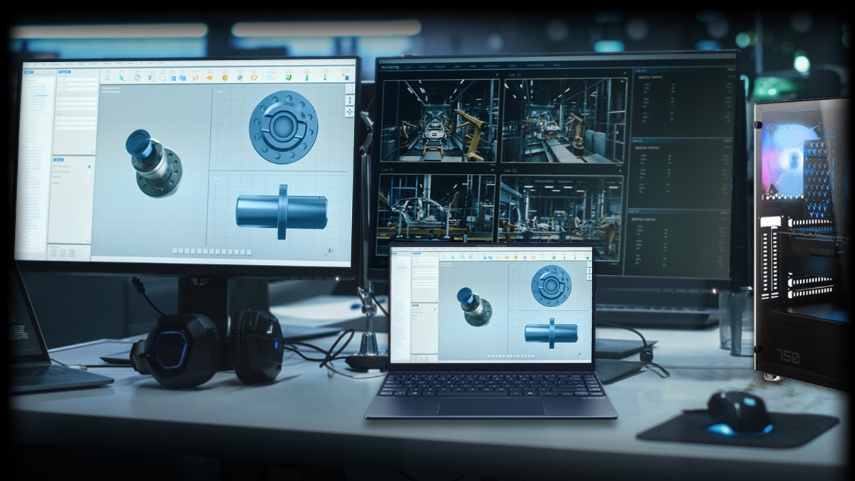 Desk with Laptop and Multiple Computer Screens with 3D Modeling Software