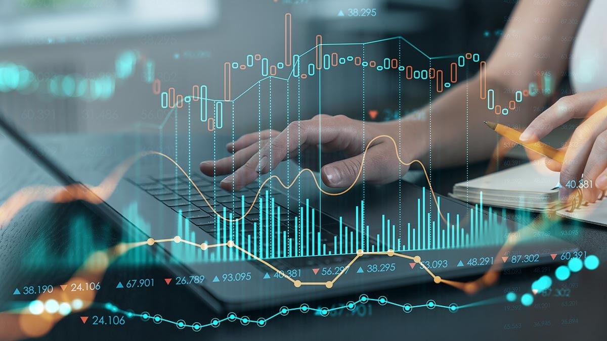 market data over woman using a laptop