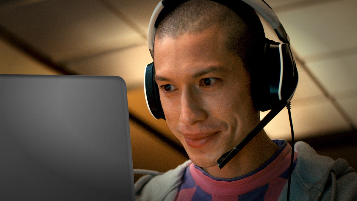 man looking at laptop