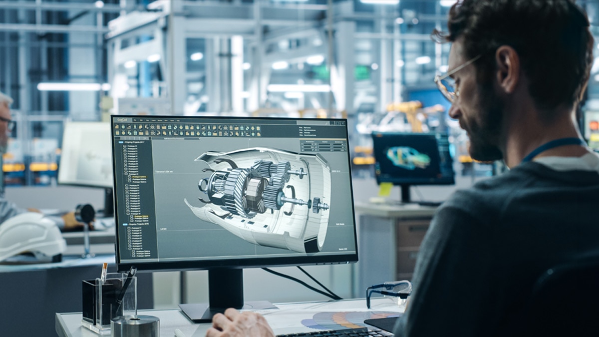 Engineer Working on Turbine Prototype on Computer