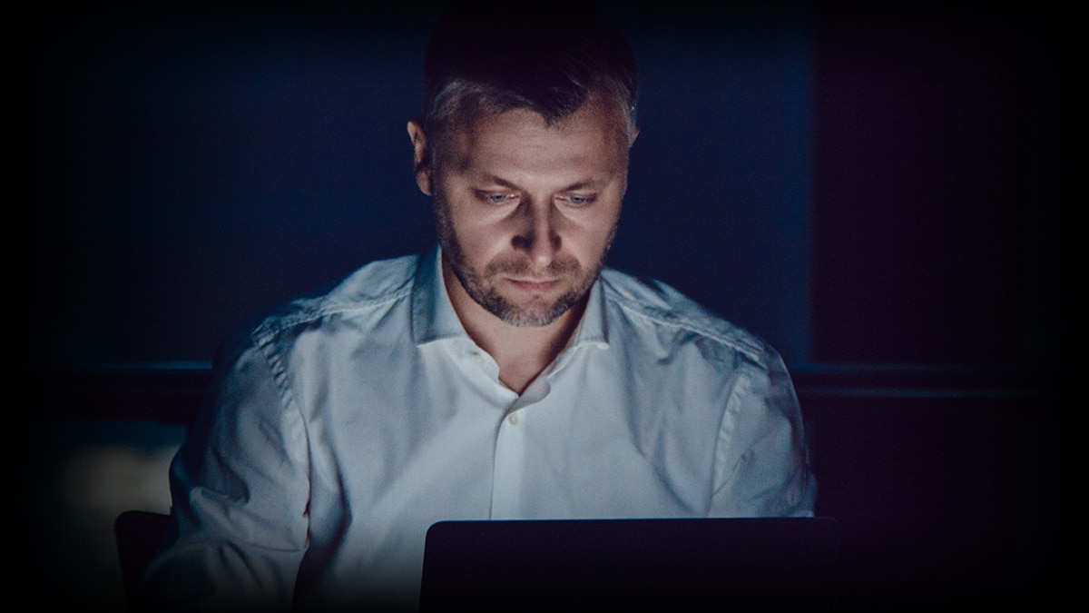 man using laptop