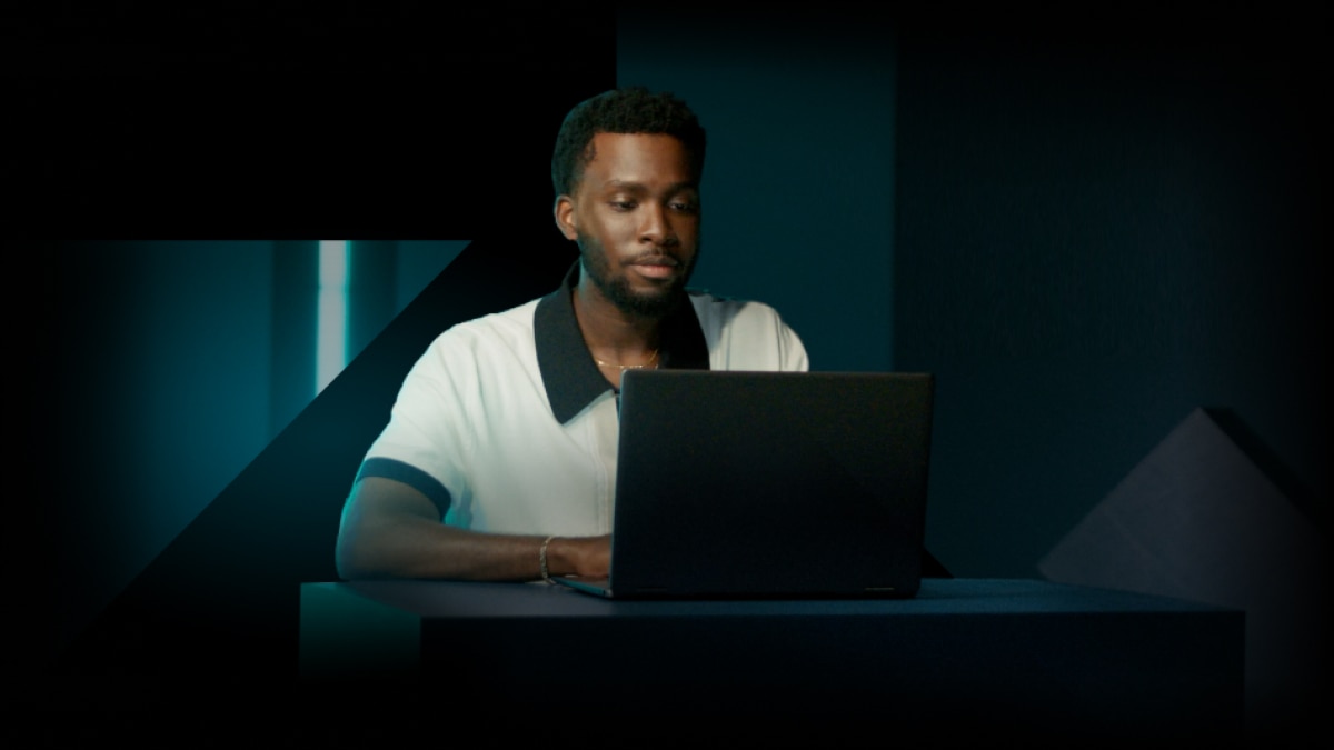 Young man working on a laptop Young man working on a laptop