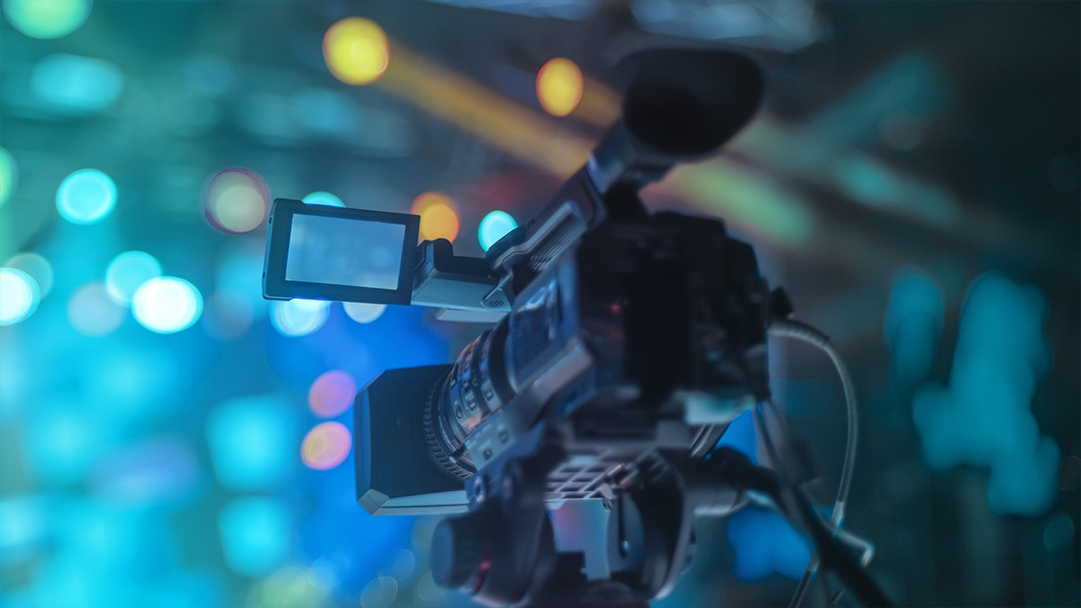 Studio camera with blurred lights in background