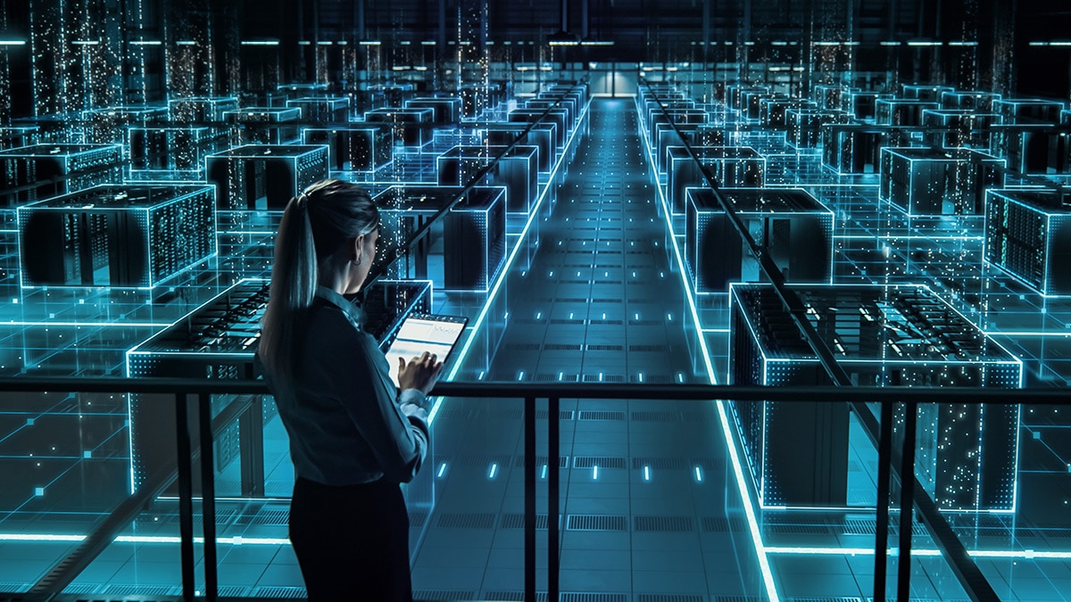 Female Data Center IT Specialist Using Tablet 