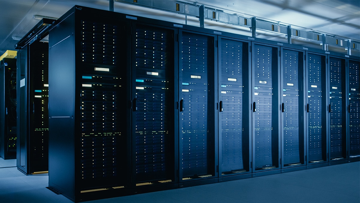 Modern Data Center with Rack Servers Illuminated in Blue